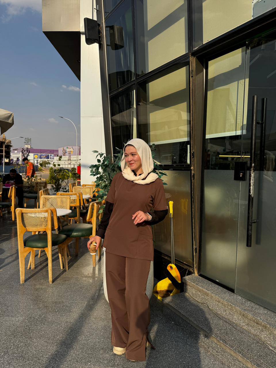 Feminie In Brown